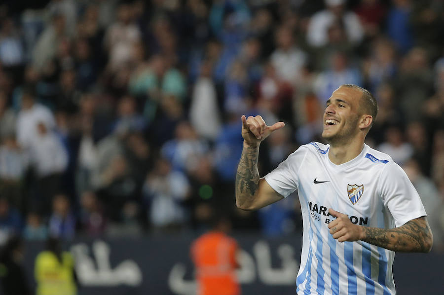 El partido del Málaga-Barcelona, en imágenes