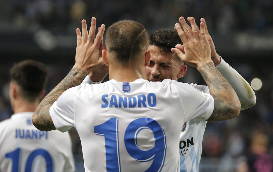 El partido del Málaga-Barcelona, en imágenes