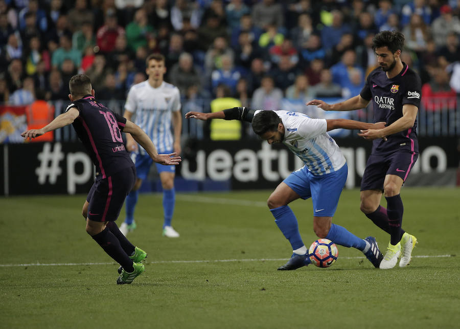 El partido del Málaga-Barcelona, en imágenes