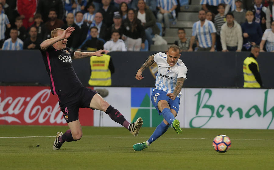 El partido del Málaga-Barcelona, en imágenes