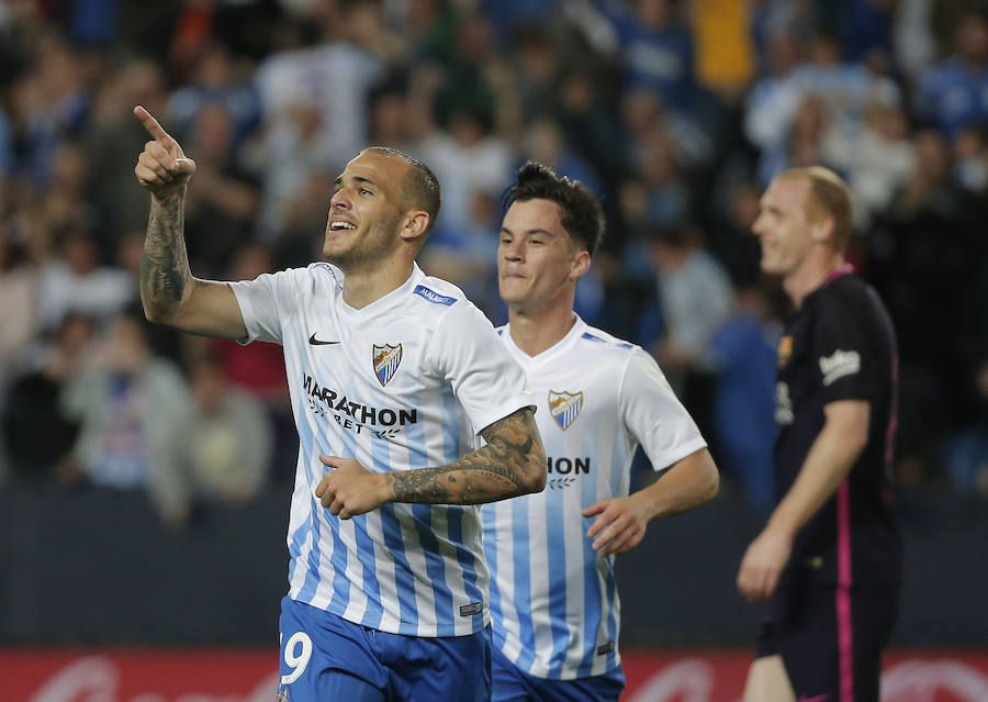 El partido del Málaga-Barcelona, en imágenes