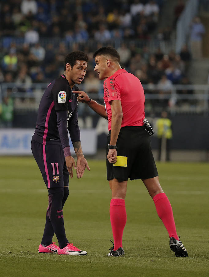 El partido del Málaga-Barcelona, en imágenes