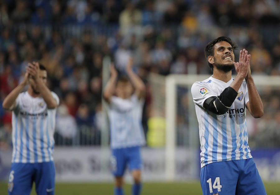 El partido del Málaga-Barcelona, en imágenes