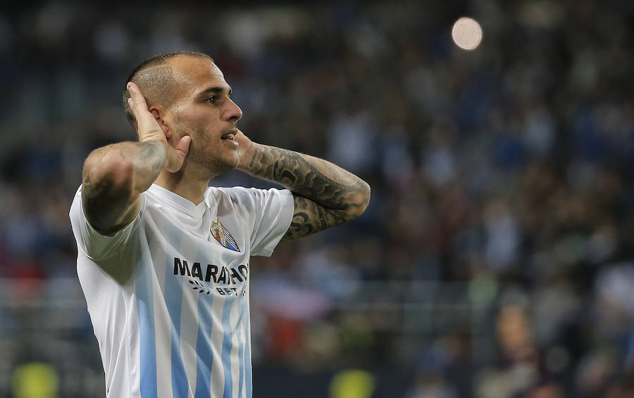 El partido del Málaga-Barcelona, en imágenes