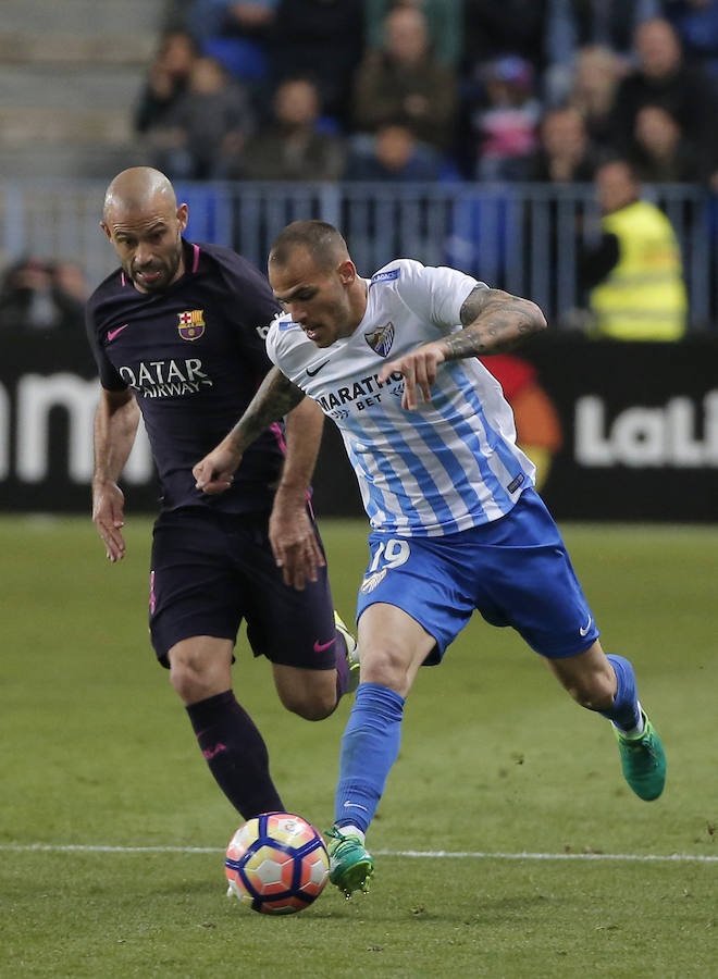 El partido del Málaga-Barcelona, en imágenes