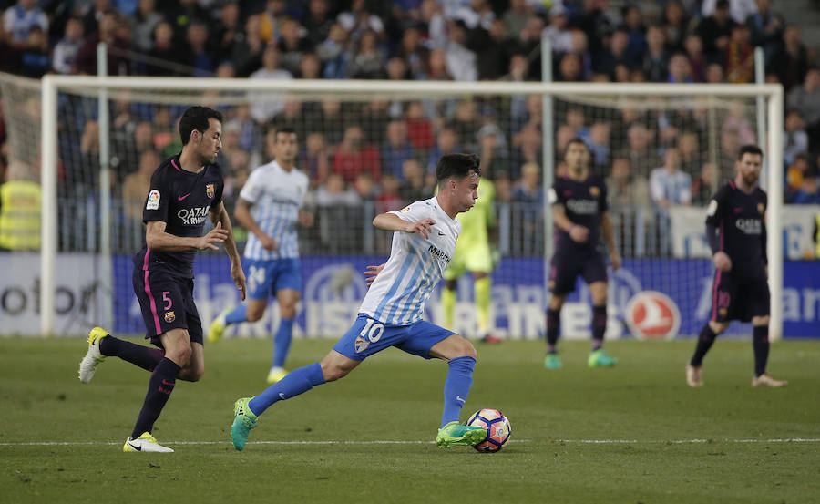 El partido del Málaga-Barcelona, en imágenes
