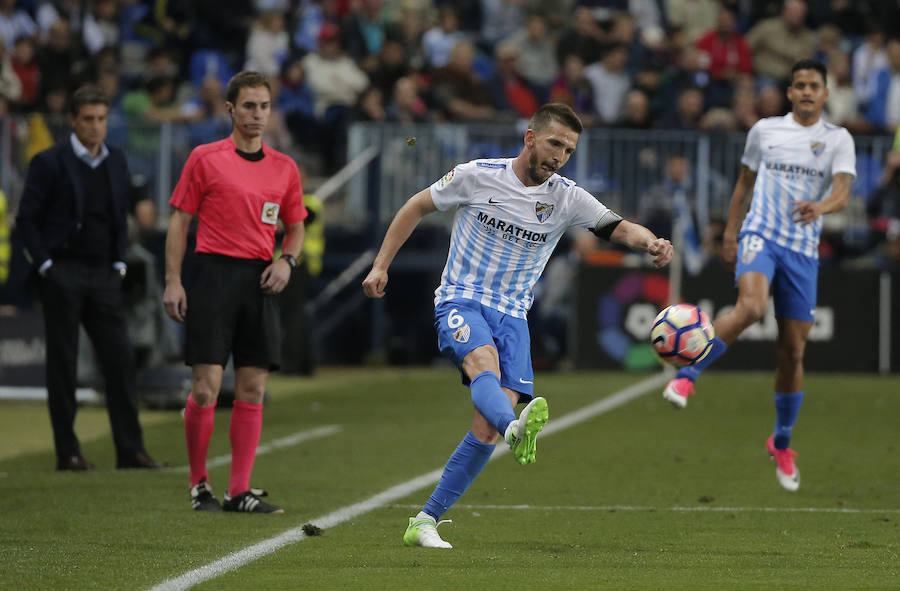 El partido del Málaga-Barcelona, en imágenes
