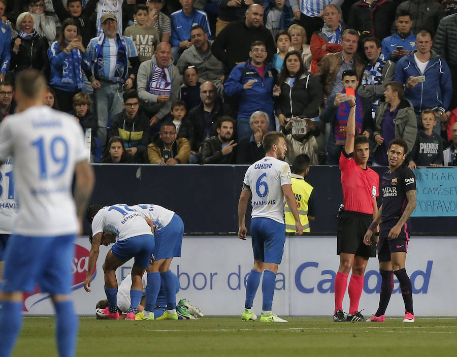 El partido del Málaga-Barcelona, en imágenes