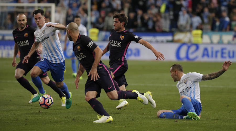 El partido del Málaga-Barcelona, en imágenes