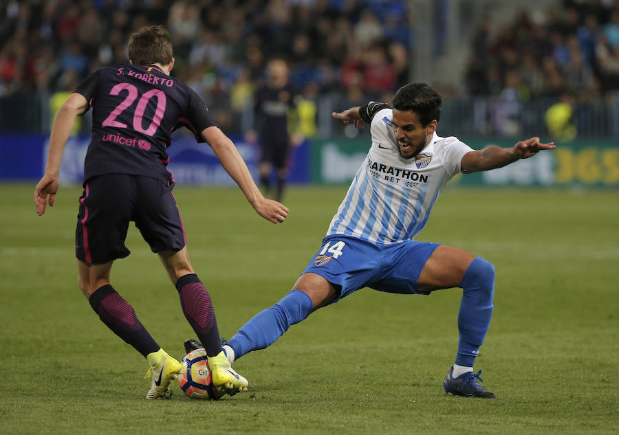 El partido del Málaga-Barcelona, en imágenes