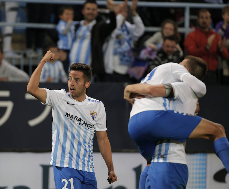 El partido del Málaga-Barcelona, en imágenes