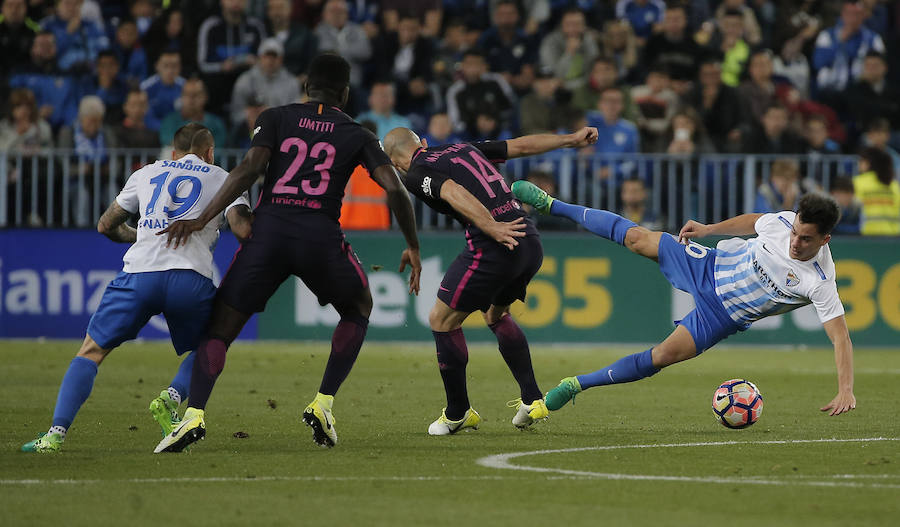 El partido del Málaga-Barcelona, en imágenes