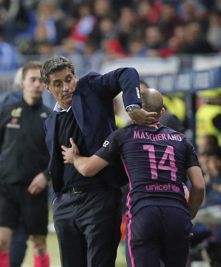 El partido del Málaga-Barcelona, en imágenes