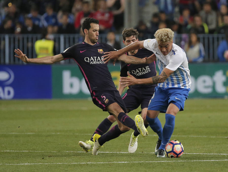 El partido del Málaga-Barcelona, en imágenes