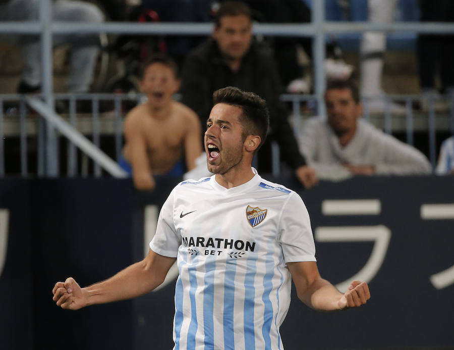 El partido del Málaga-Barcelona, en imágenes