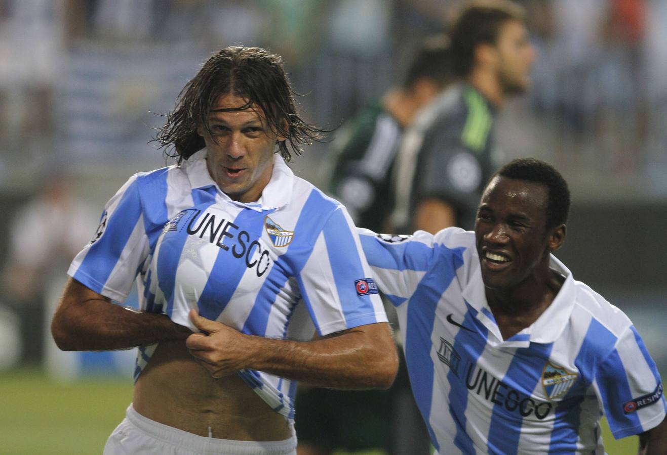 Agosto de 2012. (Málaga 2 - Panathinaikos 0) Partido de ida de la previa de la Champions League disputado en La Rosaleda. Demichelis celebra un gol seguido de Fabrice