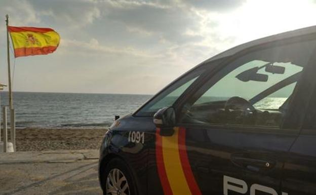 Heroic National Police officers save a man from drowning on a beach in Estepona