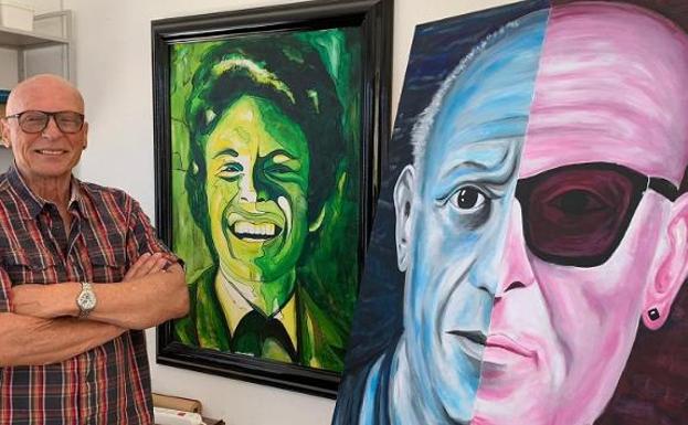Udo Burkhardt in his studio with two of his paintings, including the Picasso and Me portrait.