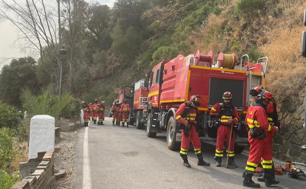 The last of the residents, evacuated from the fire, are allowed back to their homes