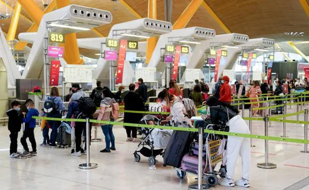 Passengers at Madrid's Barajas airport. 