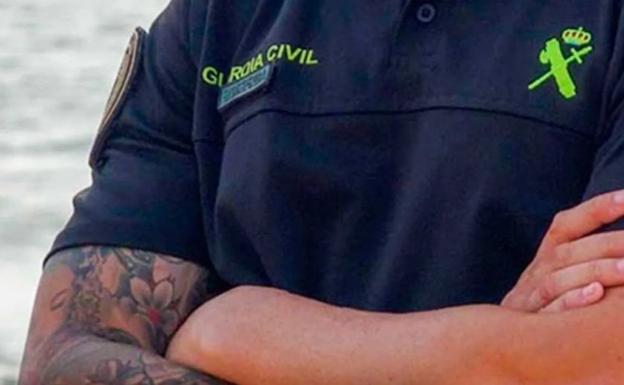A tattooed Guardia Civil officer. 