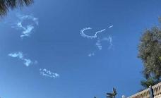 Why has a plane been 'drawing' question marks in the sky above the Costa del Sol?