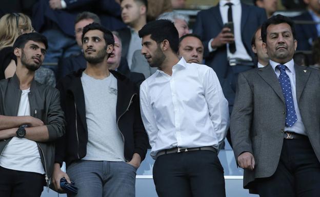 The Al-Thani family members involved in the case during a game at La Rosaleda. 