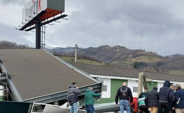 One dead after 30-metre lighting tower topples at football match in Spain