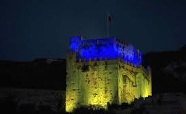 The Moorish castle lit in the colours of the Ukraine flag. 