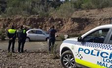 Car swept down river after Malaga reservoir gates opened