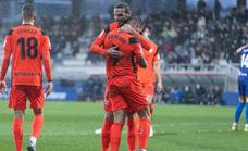 Malaga earn a crucial win away from home