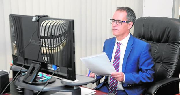 Deputy chief minister invested with award for services to Gibraltar