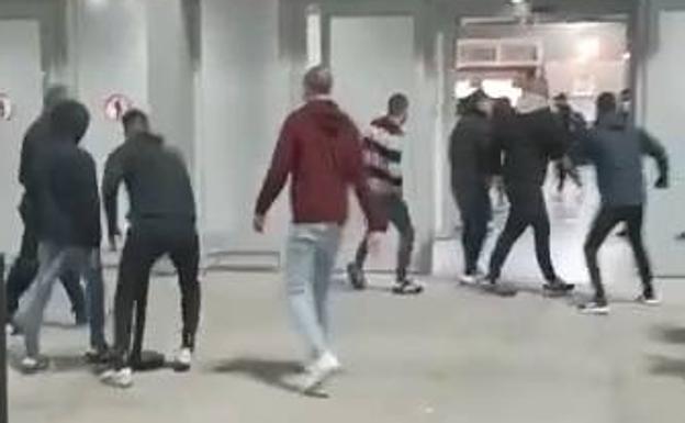 Rival football hooligans clash at Malaga Airport