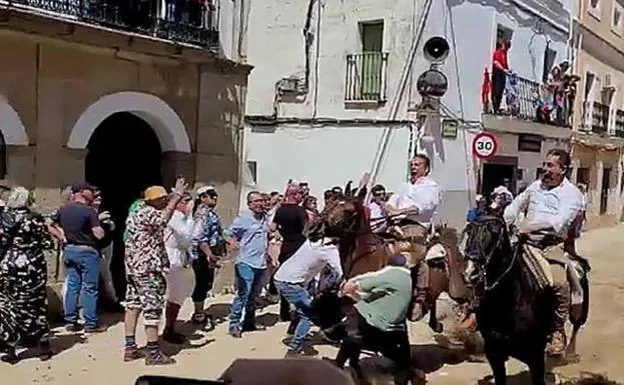 Woman knocked over during a street horse race in Spain on Easter Monday remains in a serious condition in hospital