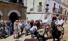 Woman knocked over during a street horse race in Spain on Easter Monday remains in a serious condition in hospital