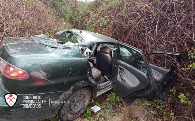 Driver rescued after car plunges 30-metres down an embankment