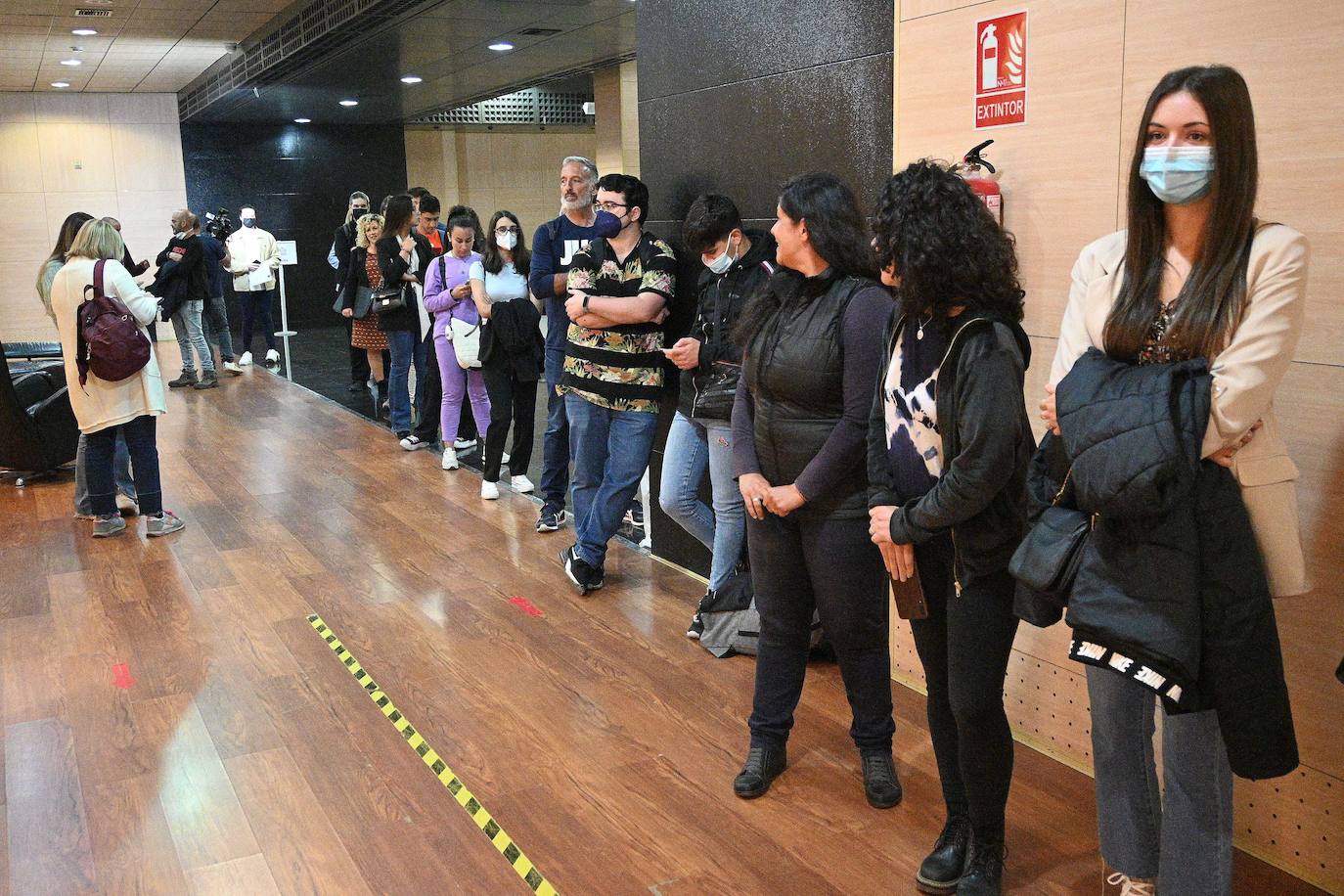 Applicants wait in line to be interviewd for a job at Starlite. /JOSELE