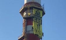 Greenpeace activists scale power plant chimney in Malaga to protest use of ‘Russian gas’