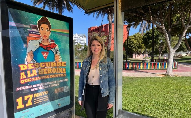 Rocío Rodriguez at one of the bus stops where the posters have been located. 