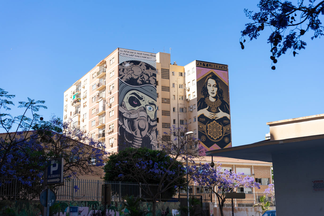 D*Face's mural (left), alongside Obey's (right). 