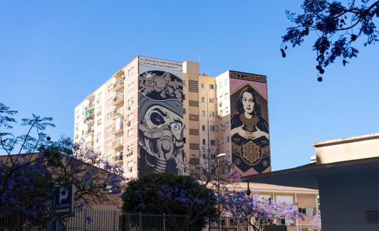 D*Face's mural (left), alongside Obey's (right). 