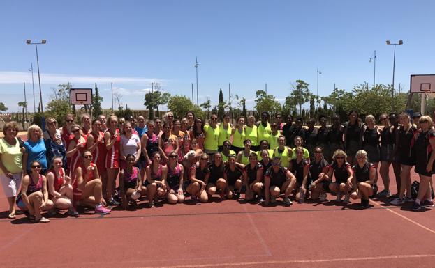 Netball players pose together at the last summer tournament event in 2019. 