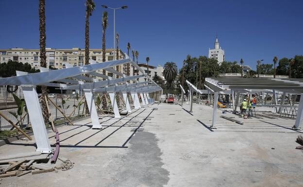 The solar pergolas will provide shade for employees' vehicles. 