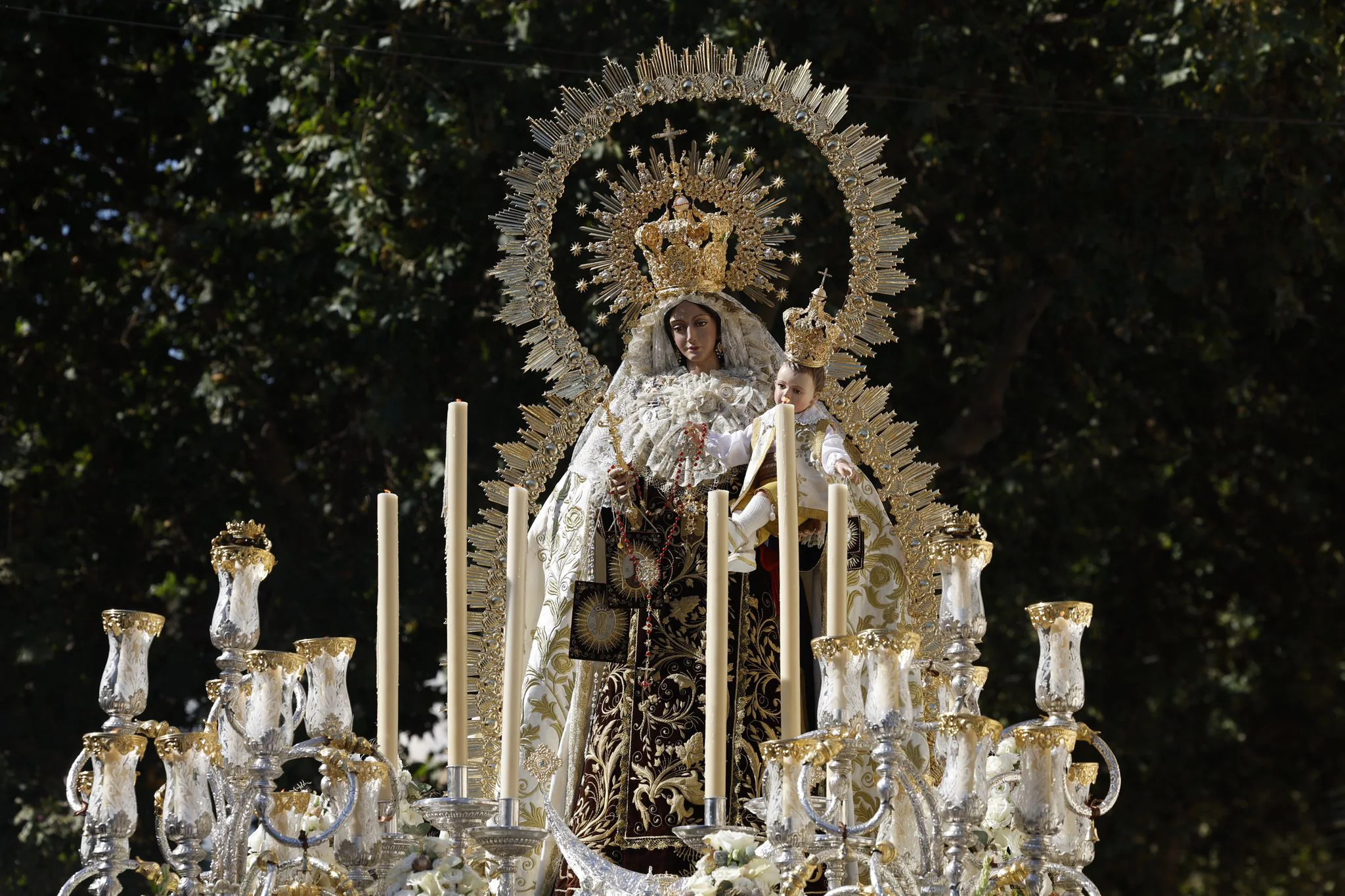 In photos, the Virgen del Carmen processions return along the length of Costa del Sol