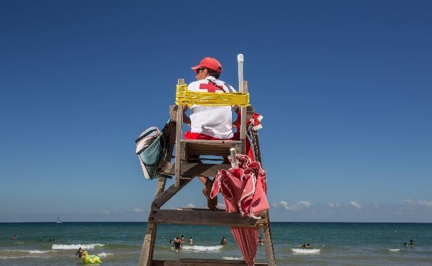 Lifeguard on the beach of Oliva. 