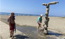 Axarquía beach users: "It's good that they turned off the showers, if there is a drought we all have to save water"