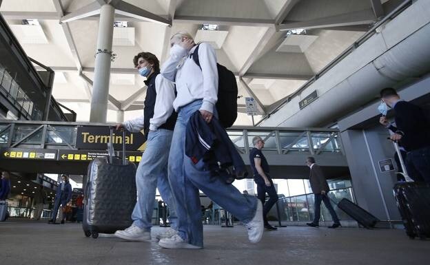Tourists at Malaga airport. 