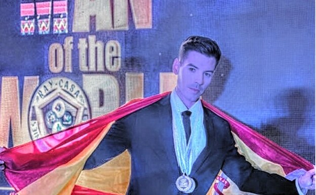 Francis in the Philippines with his medals. 