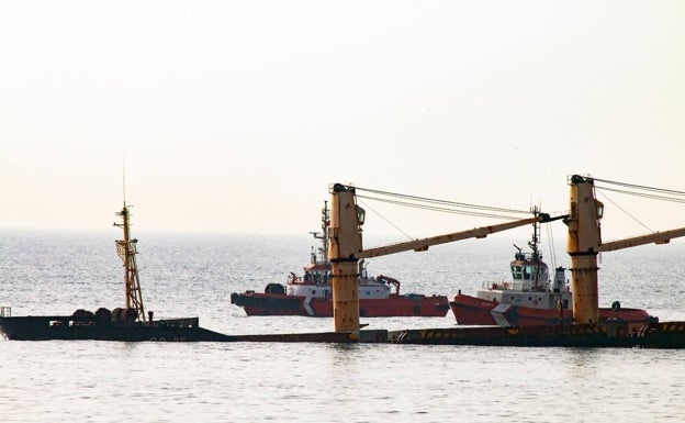 Marine salvors from the Netherlands are assessing the beached OS 35 bulk carrier after collision with another ship