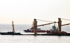 Marine salvors from the Netherlands are assessing the beached OS 35 bulk carrier after collision with another ship